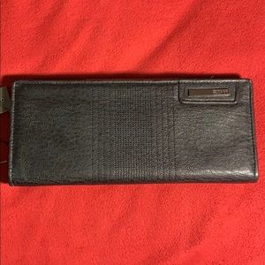 Black leather clutch